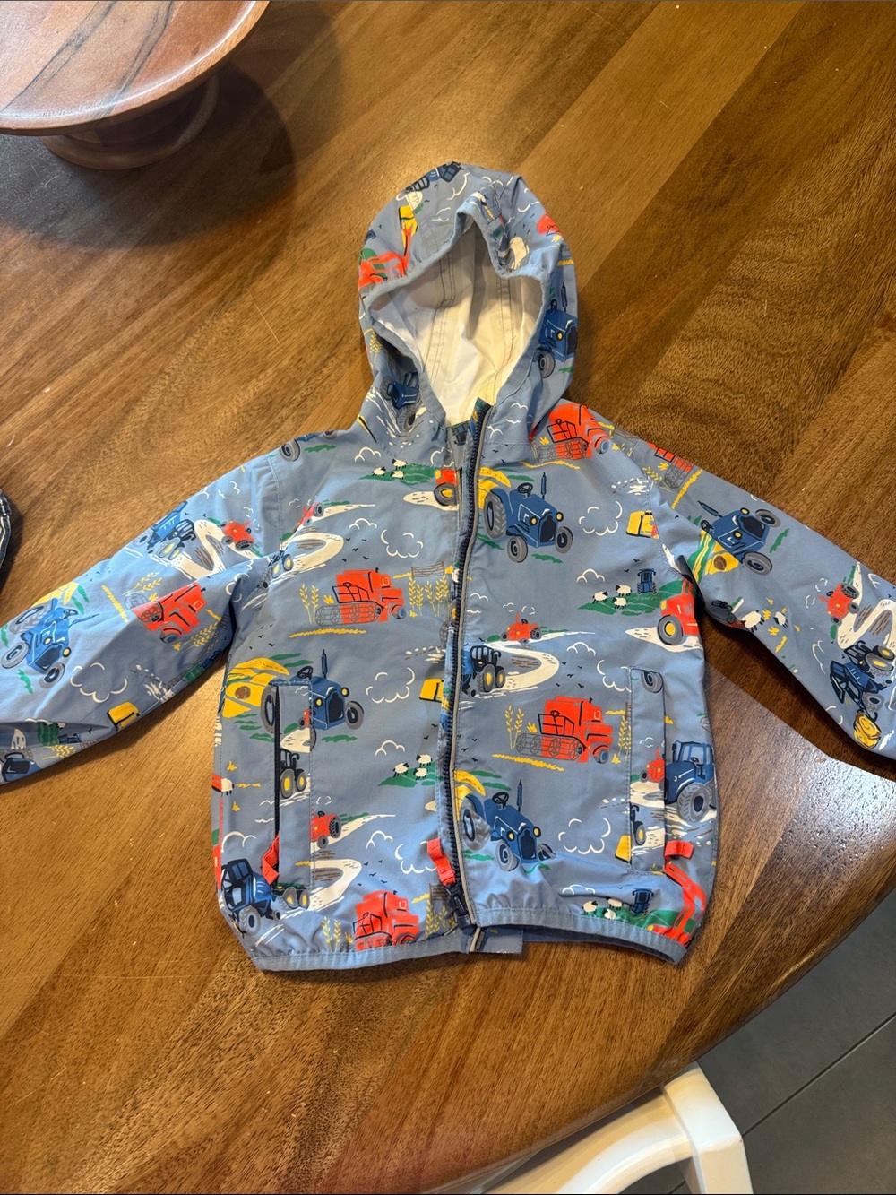 Baby Boden Hooded Rain Jacket with Colorful Tractor Farm Print - Blue